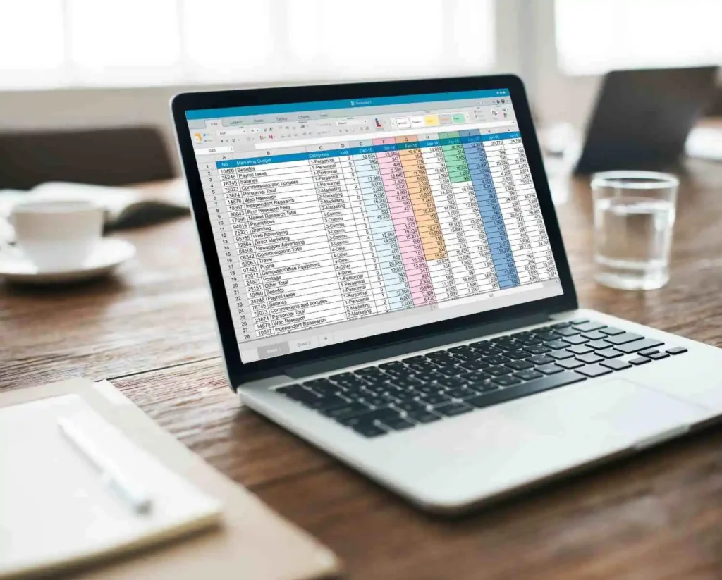 scored comparison table of top AI SEO agencies on a laptop screen