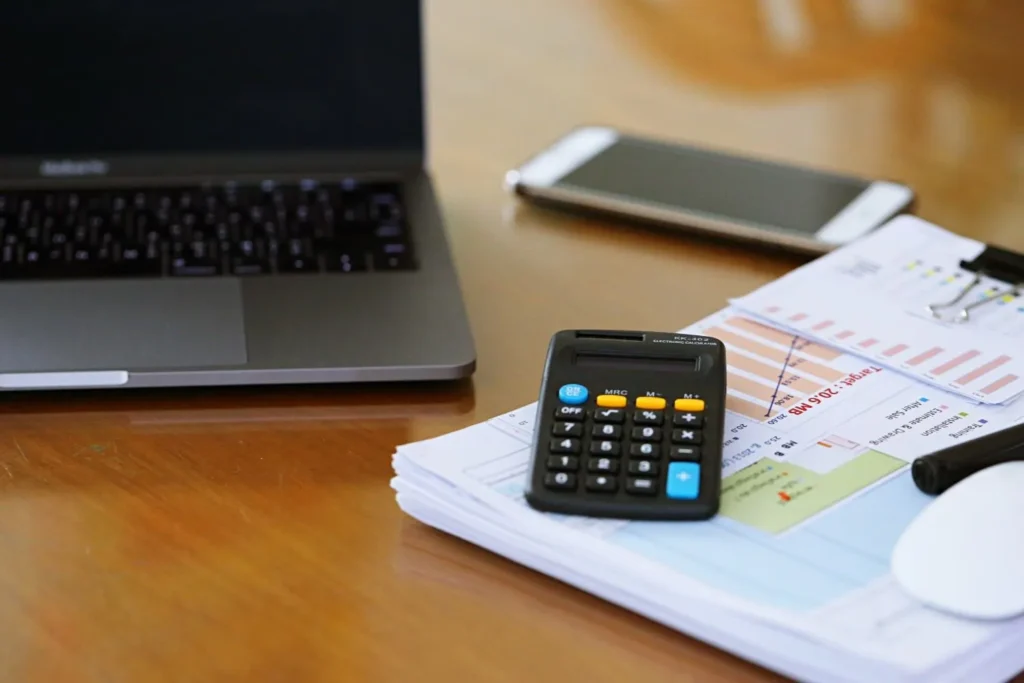 calculator next to AI SEO agency retainer pricing breakdown