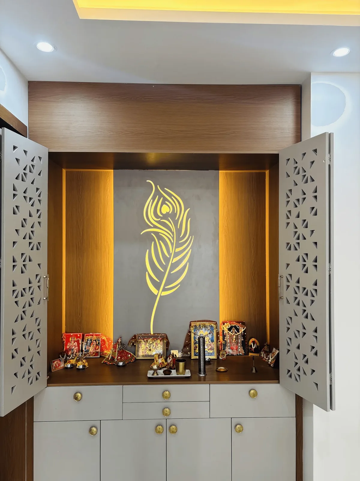 Custom pooja unit designed by Elegante Interiors for a Bengaluru home
