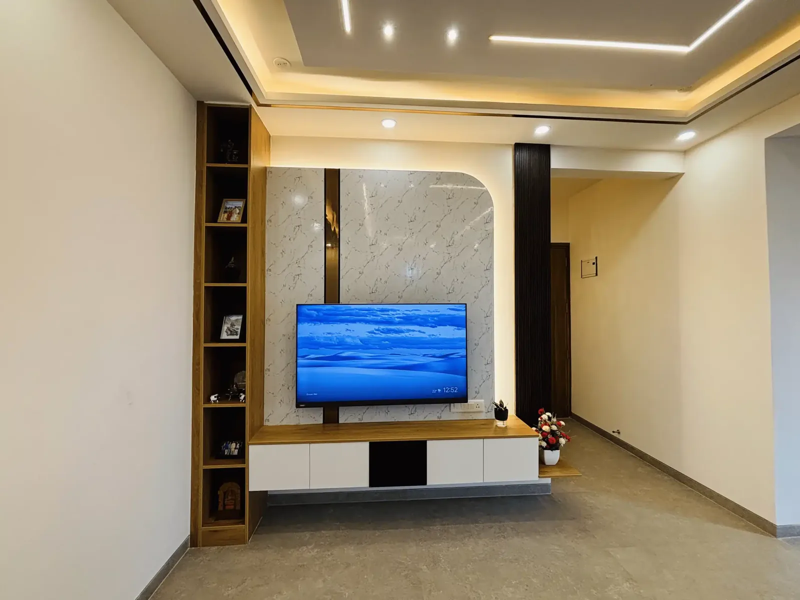 Living room TV unit and wall panelling by Elegante Interiors