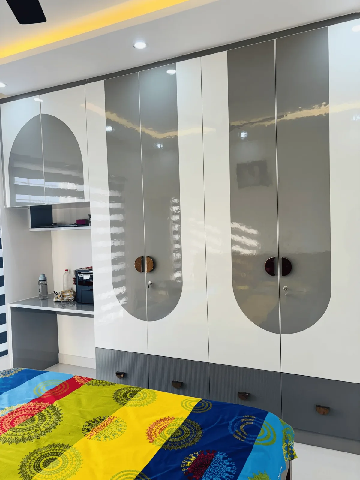 Fitted wardrobe and storage designed by Elegante Interiors