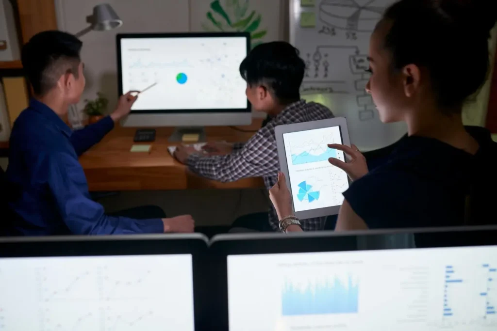 Full-stack marketing team reviewing SEO, ads and call data together