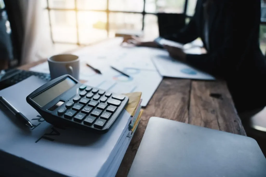 Formula for calculating HVAC cost per booked job from agency fees and ad spend