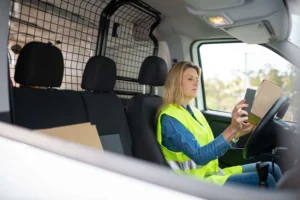 Plumber checking how AI search for home service businesses lists local contractors