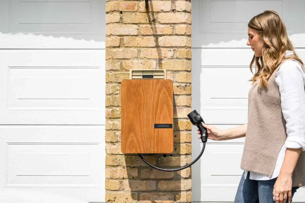 Electrician installing an EV charger, a high-ticket job to document for AI SEO for electricians